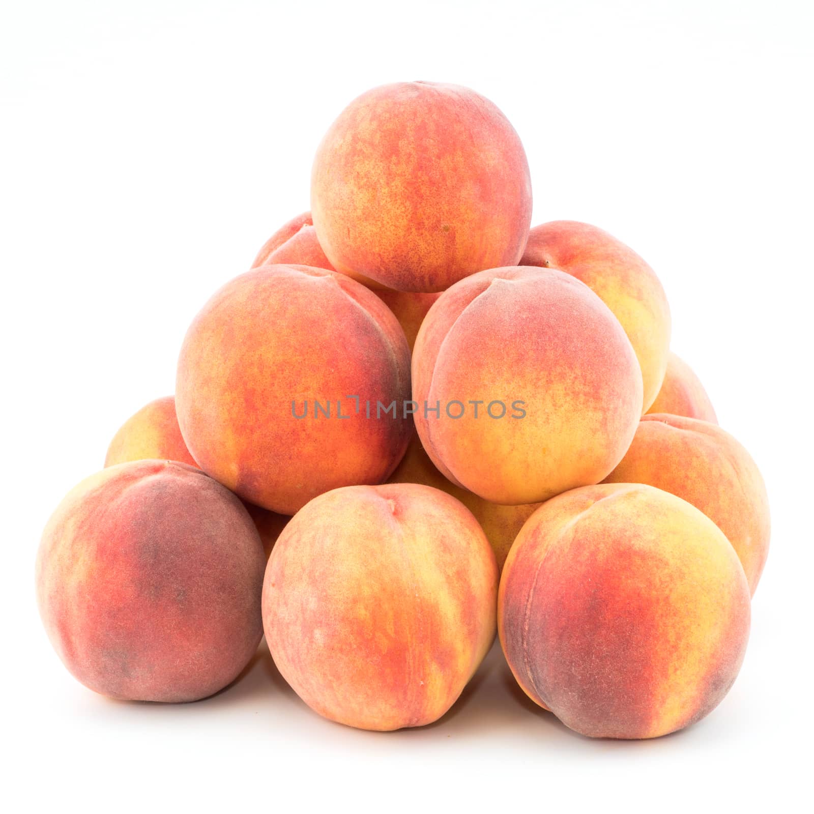 Ripe peach fruit isolated on white background cutout. Selective focus.
