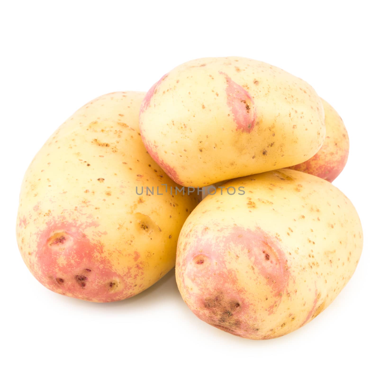 New potato isolated on white background. Selective focus.