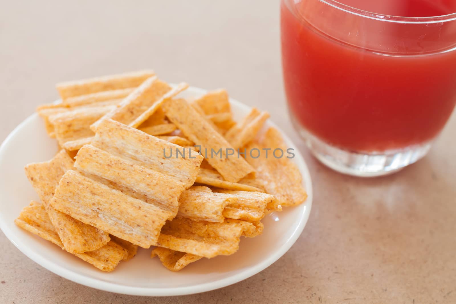 Snack on white plate with fruit punch, stock photo