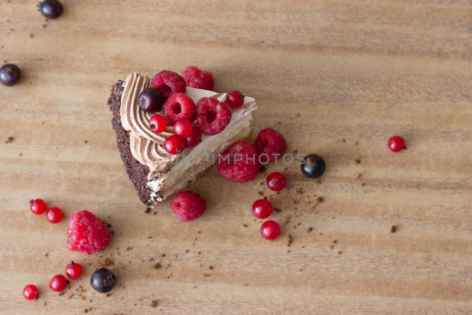 peace of cake decorated with fresh berries