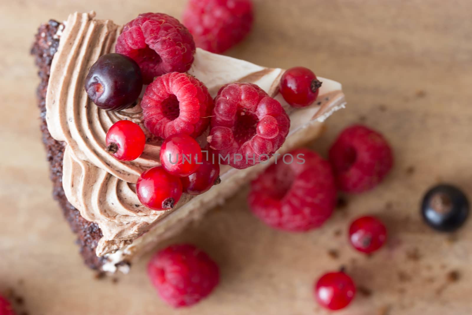 peace of cake decorated with fresh berries