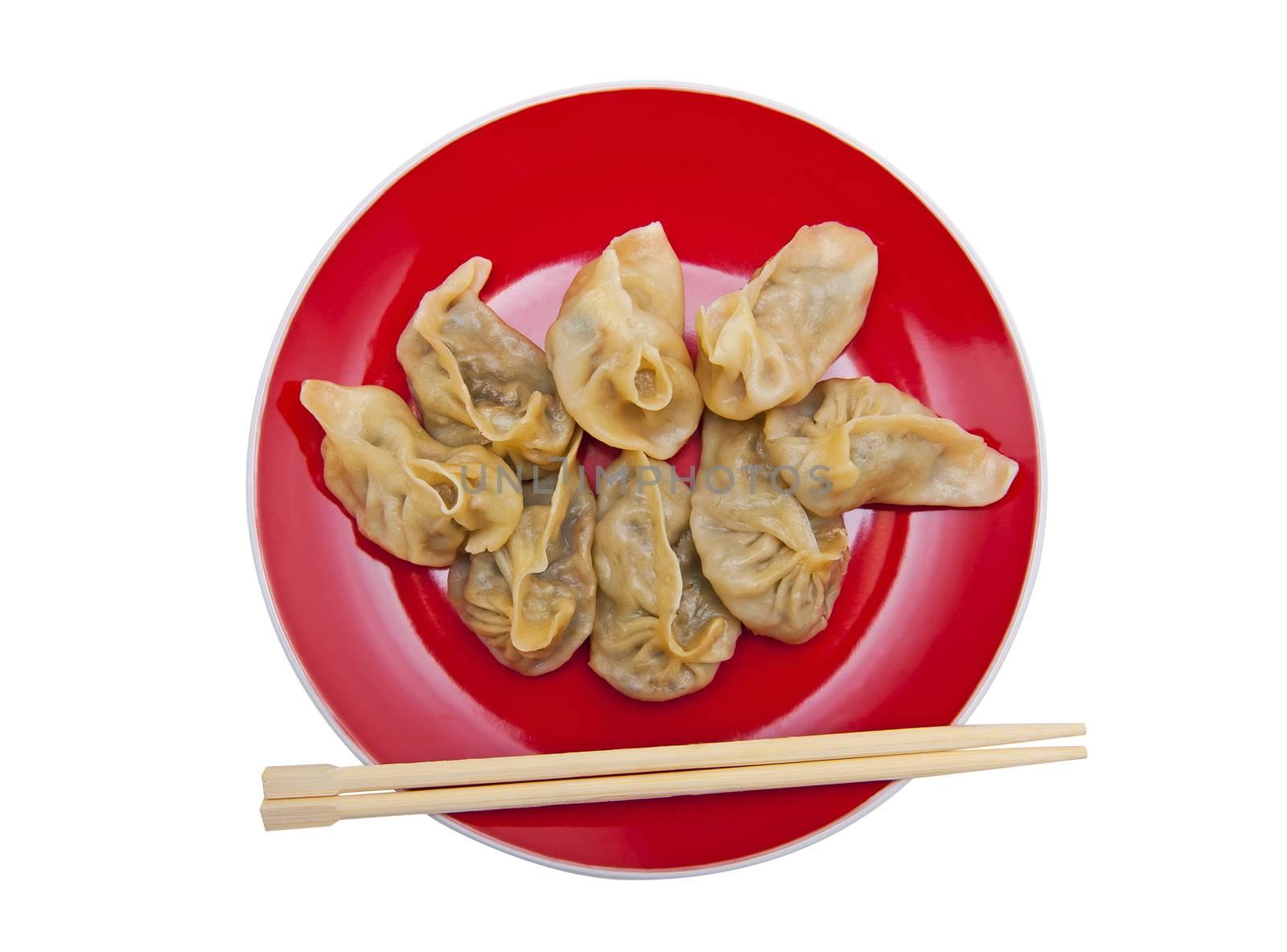 Dumplings on the red plate isolated on the white background by Yaurinko