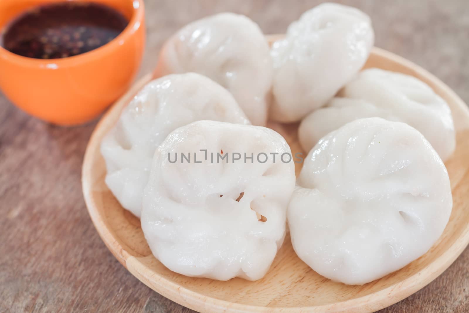 Chinese leek steamed dessert on wooden table, stock photo