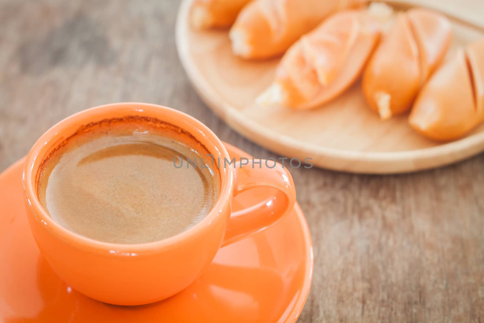 Hot coffee on wooden table, stock photo