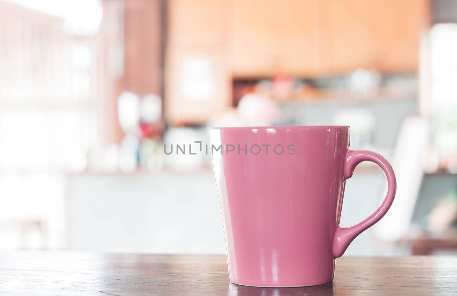 Coffee mug in coffee shop, stock photo
