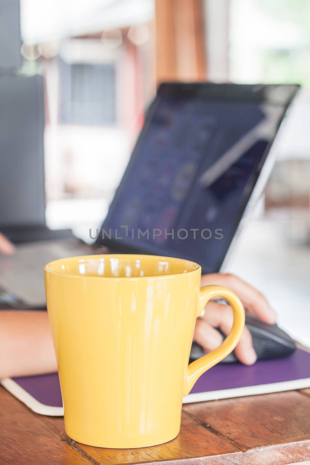 Coffee mug in coffee shop, stock photo