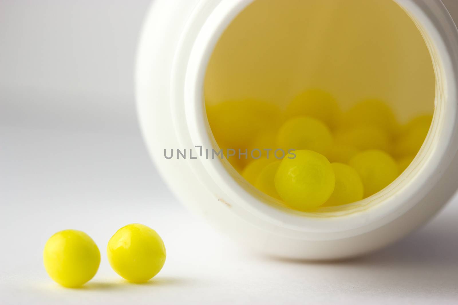 open bottle witn yellow pills by liwei12