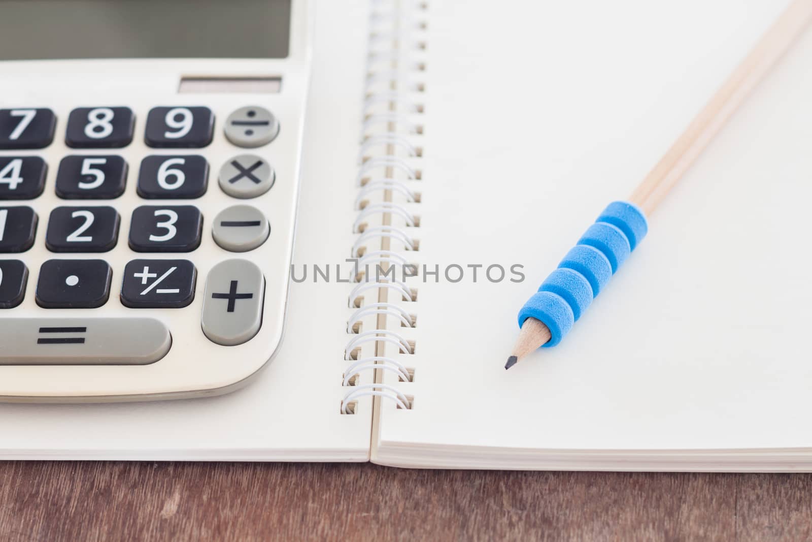 Open blank notebook with pencil, stock photo