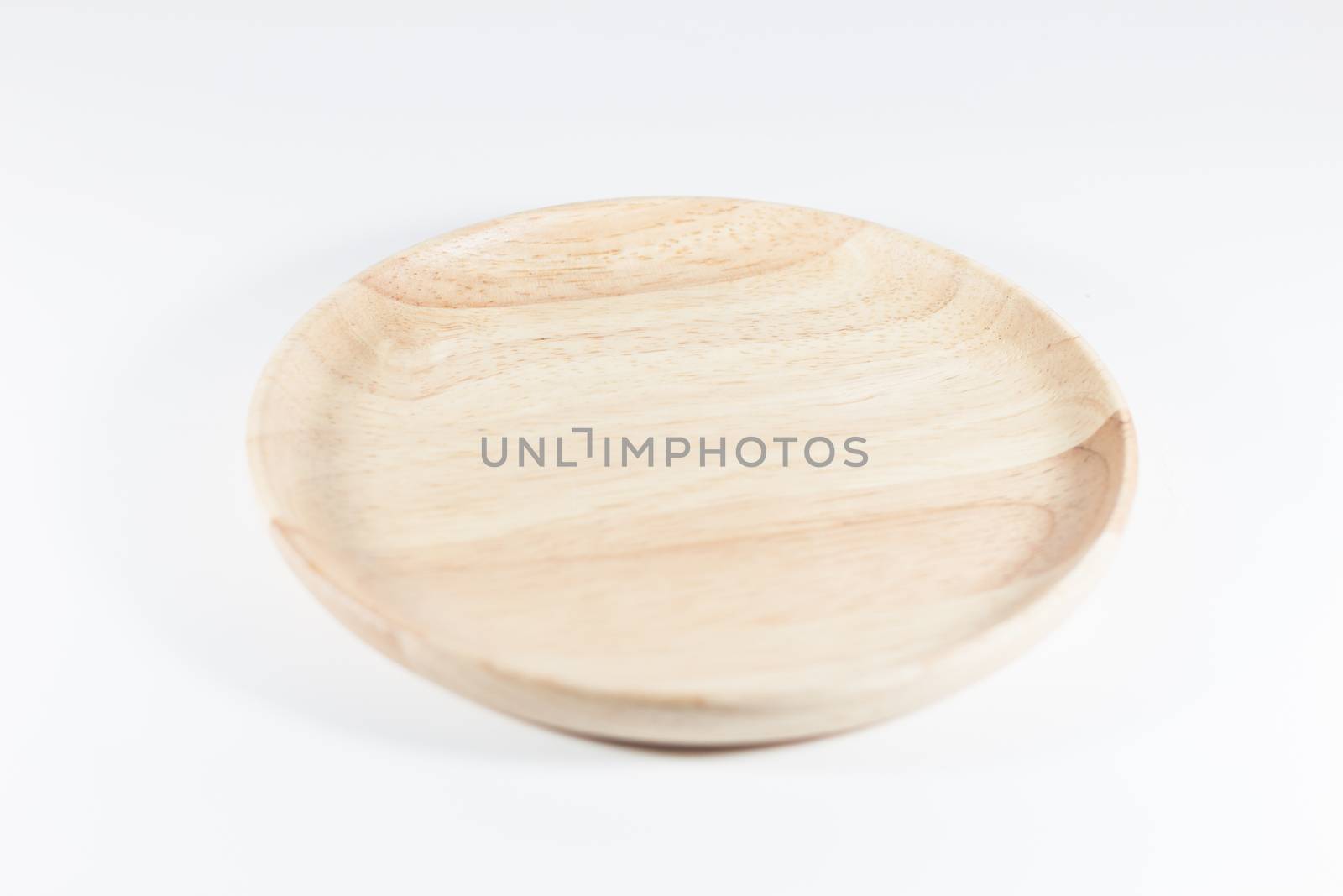 Wooden plate isolated on white background, stock photo