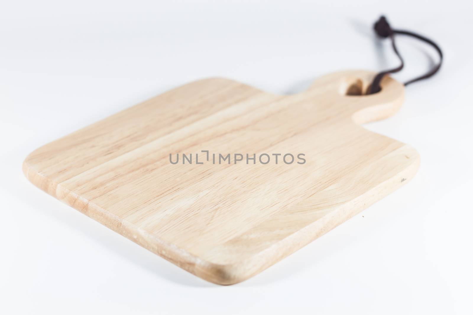 Wooden plate isolated on white background, stock photo