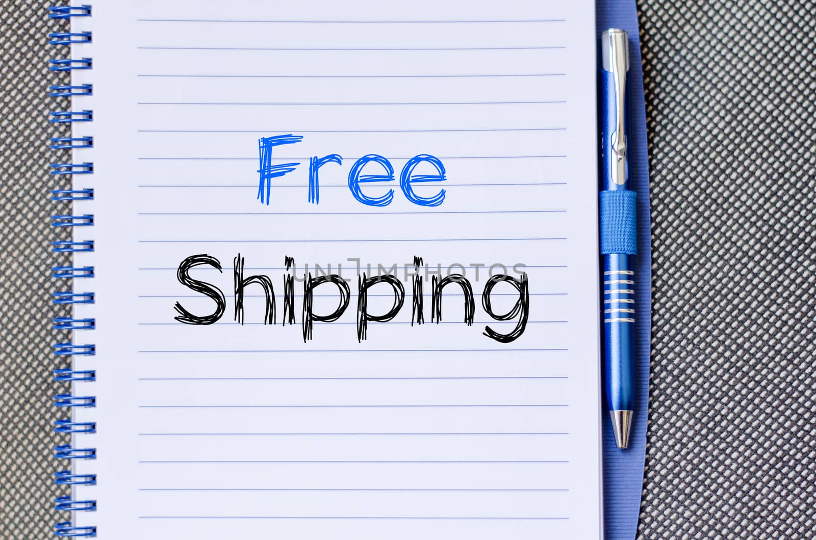 Free shipping text concept write on notebook