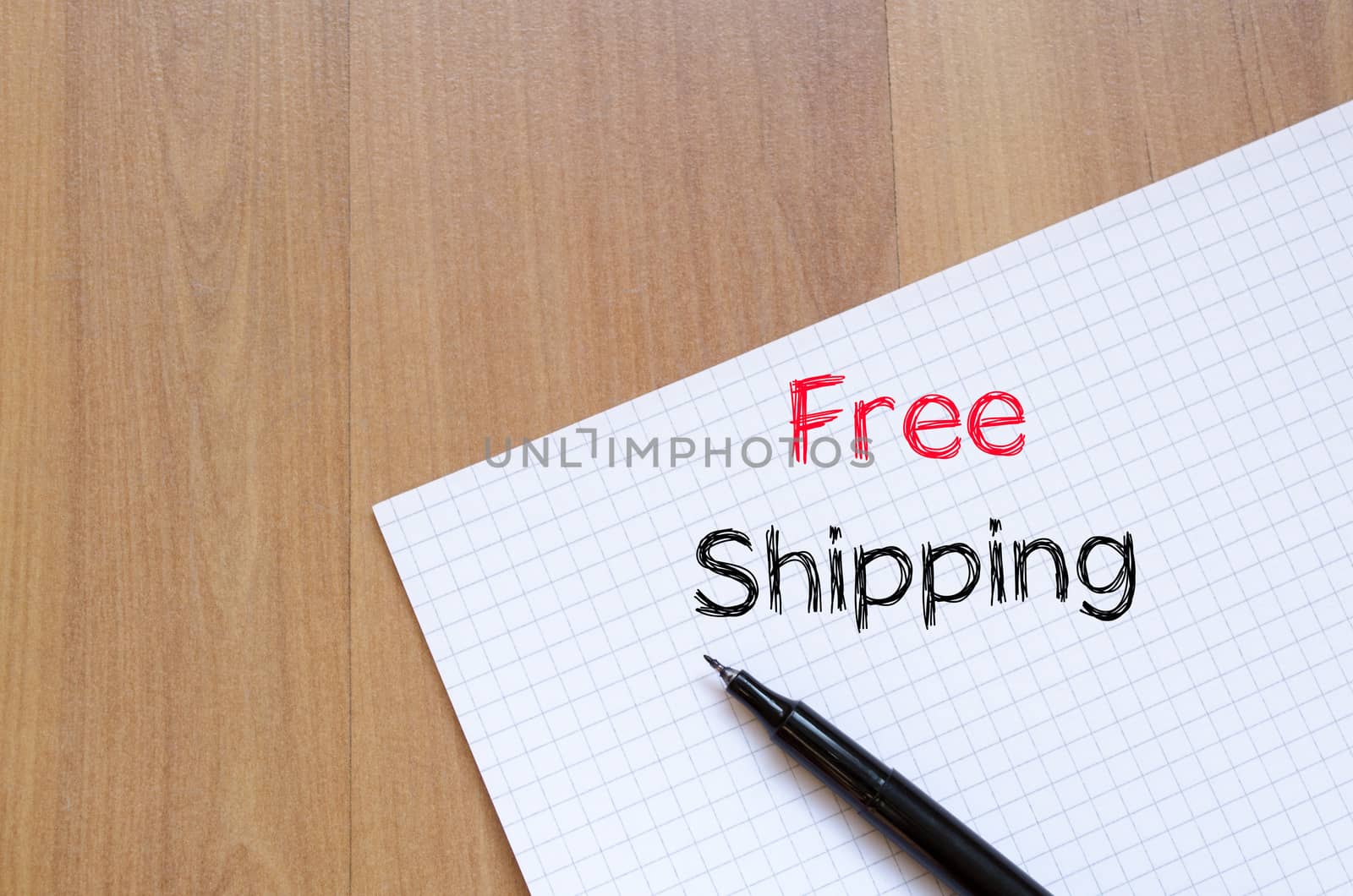 Free shipping text concept write on notebook