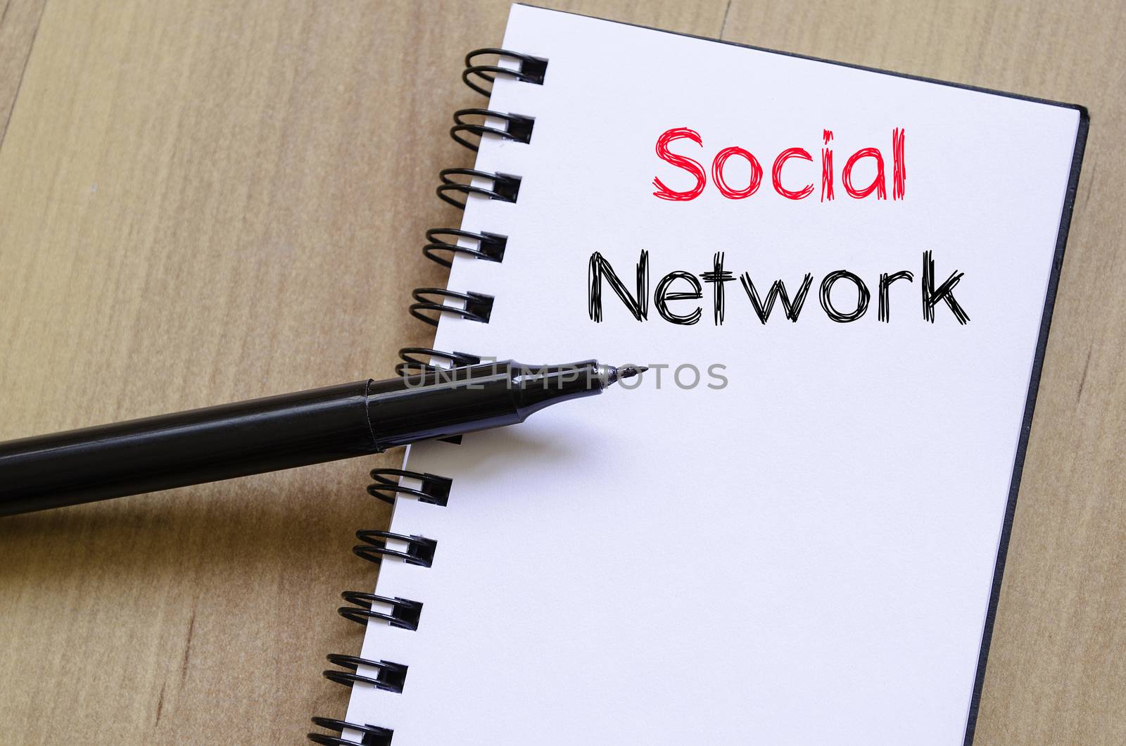 Social network text concept write on notebook