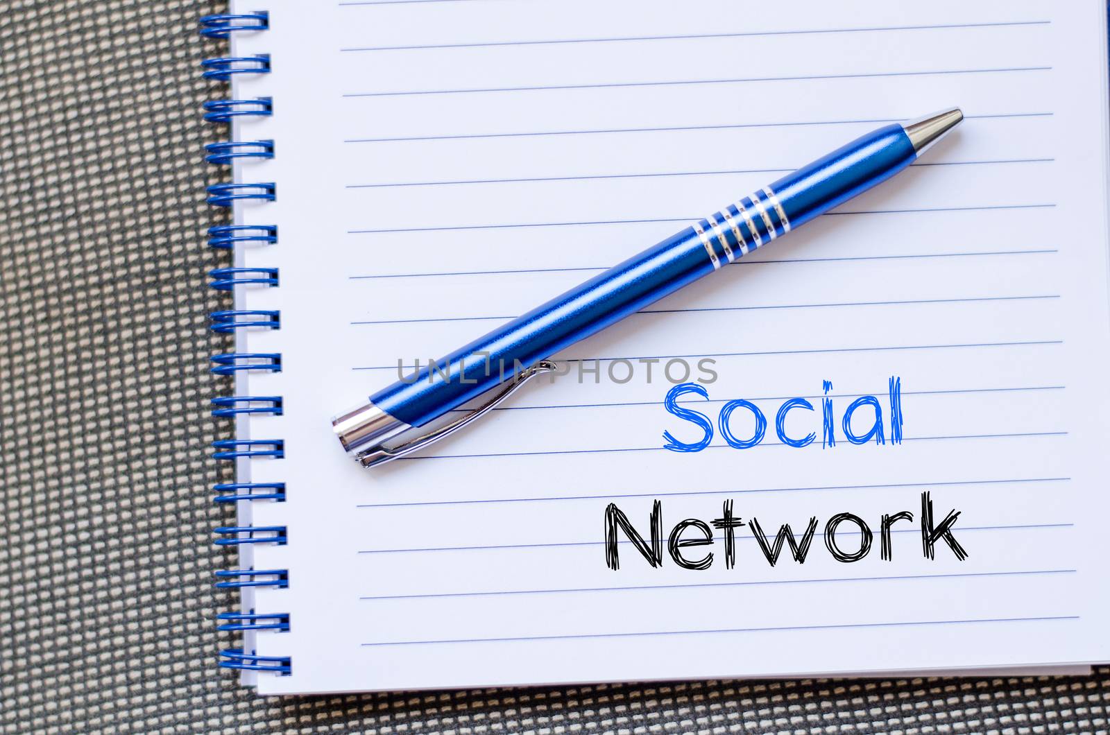 Social network text concept write on notebook