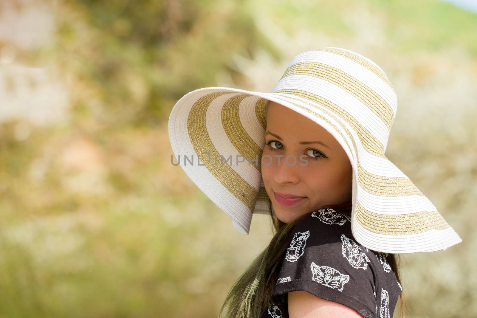 cheerful fashionable woman with hat by artush