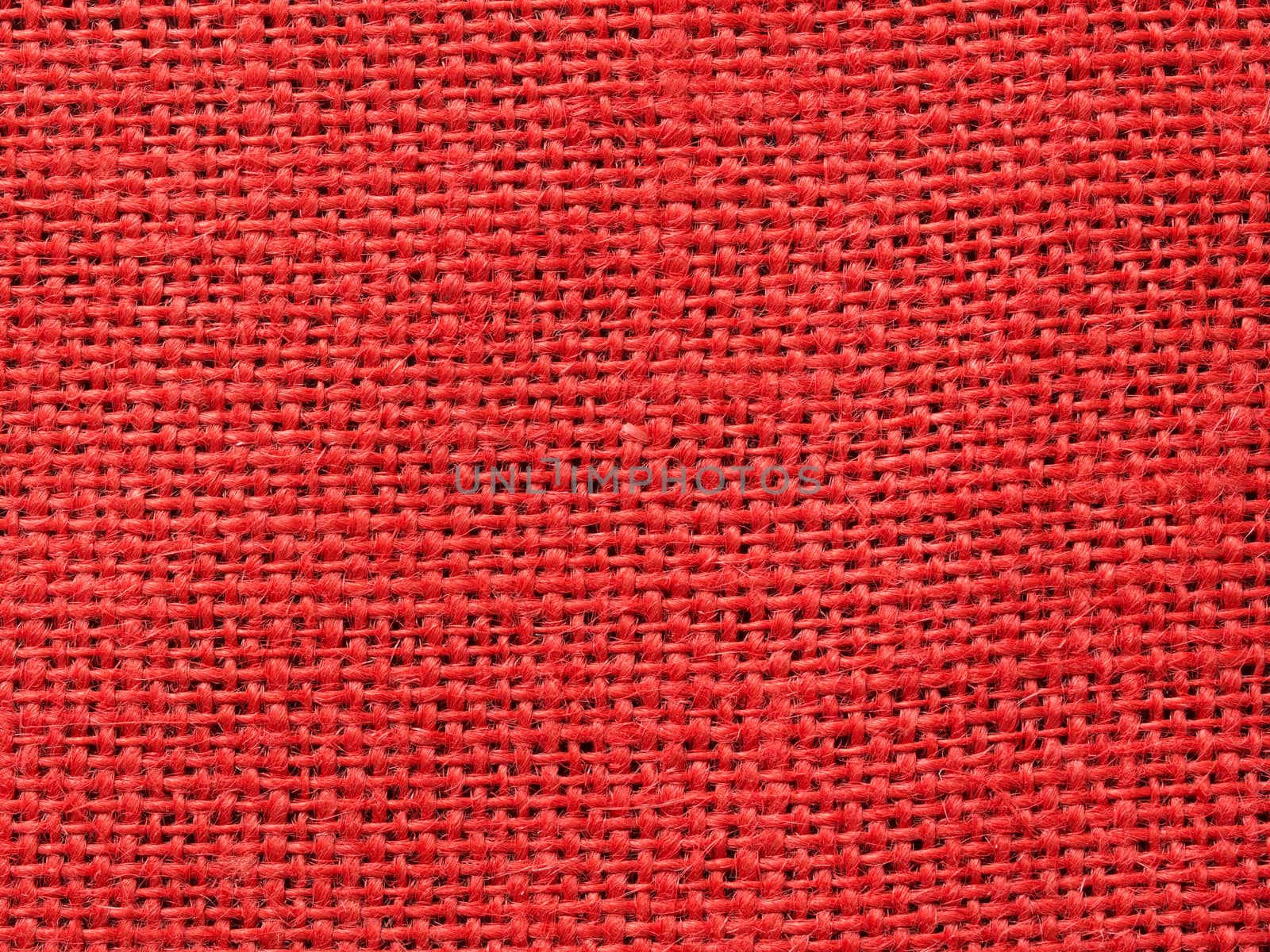 close up of red burlap fabric texture background