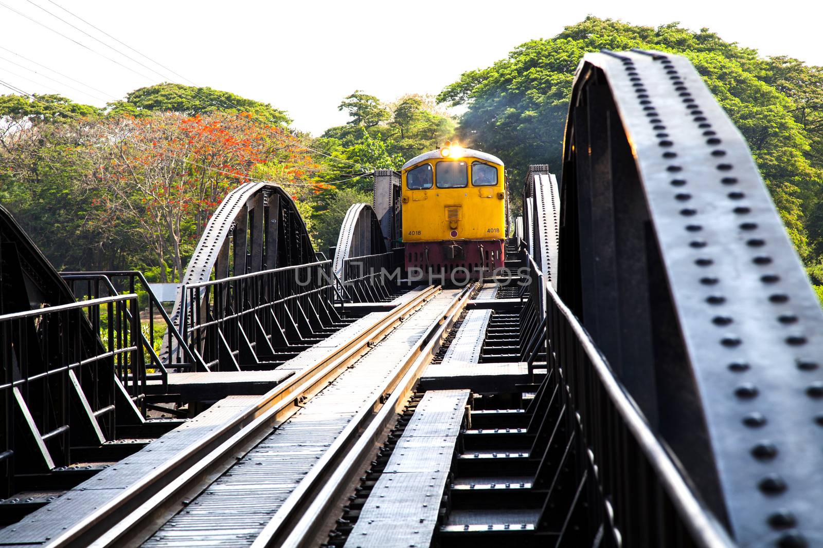 The train on The Bridge of the River Kwai (the Death Railway Bridge over River Kwai) in Kanchanaburi, Thailand