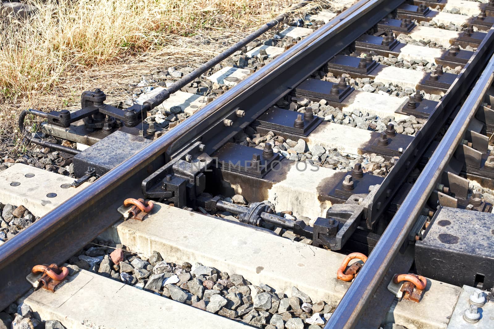 Railway Tracks and Switch near Train Station.