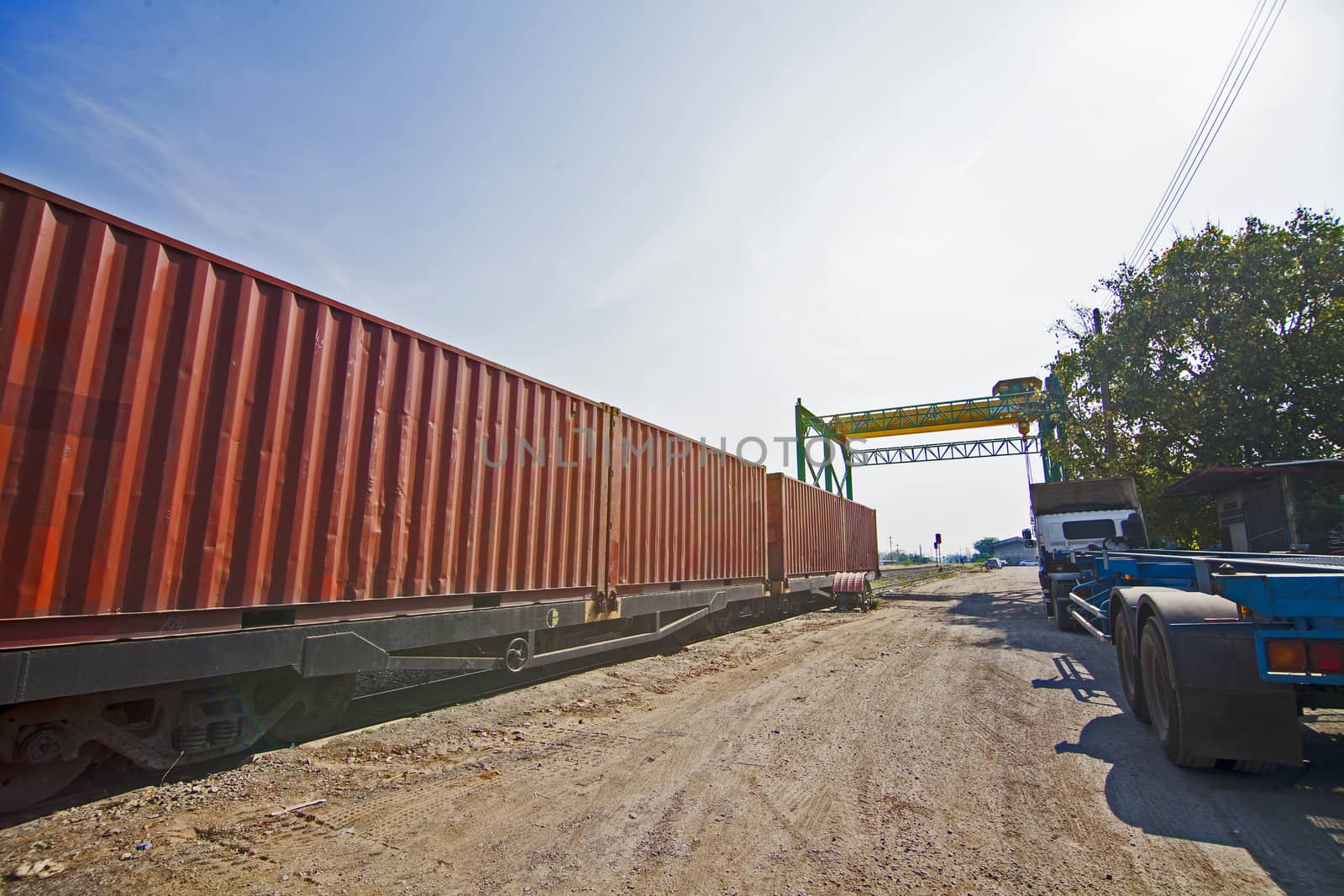 Freight train with cargo containers passing by