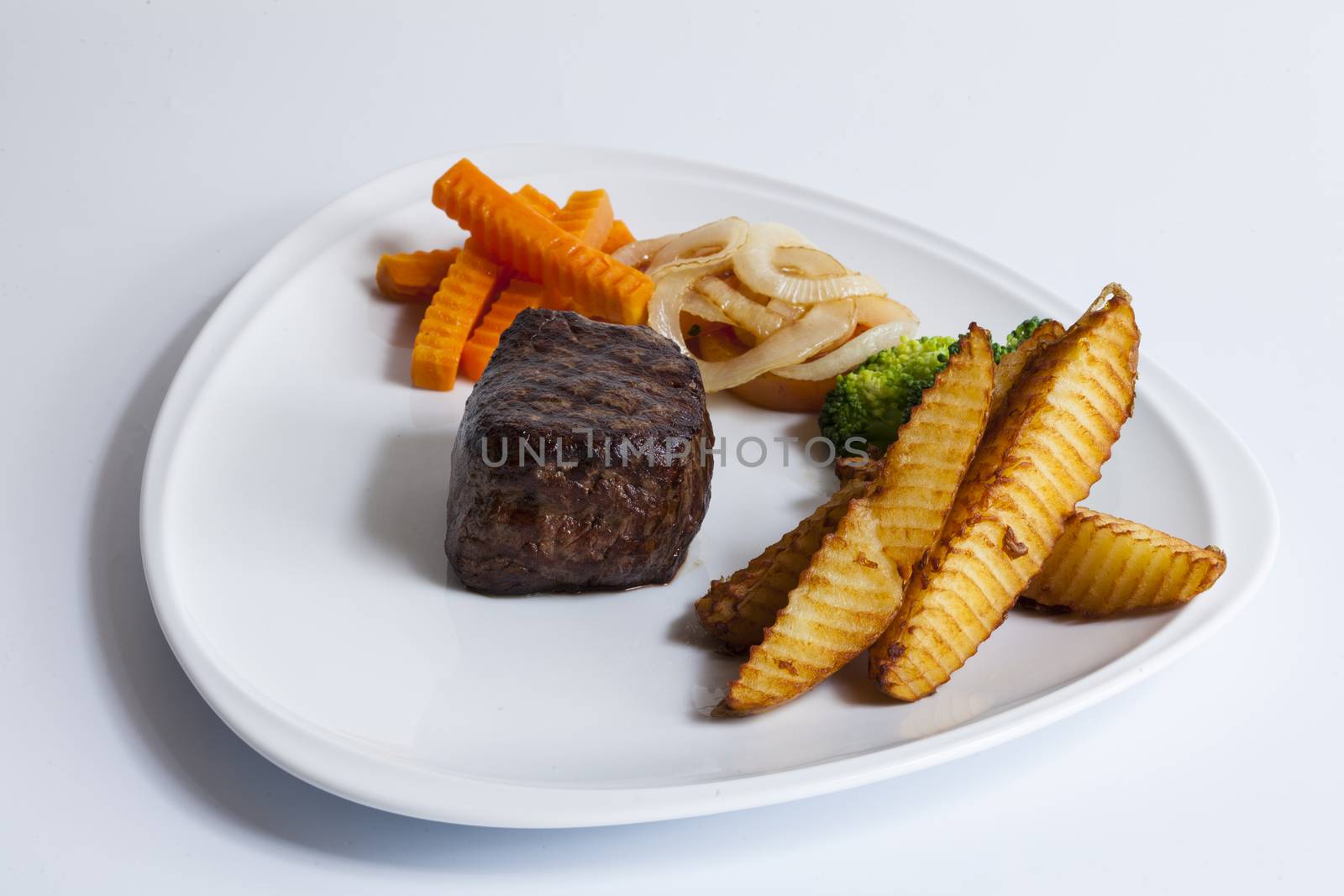 Grilled beef steaks and vegetables,luxury hotel food.