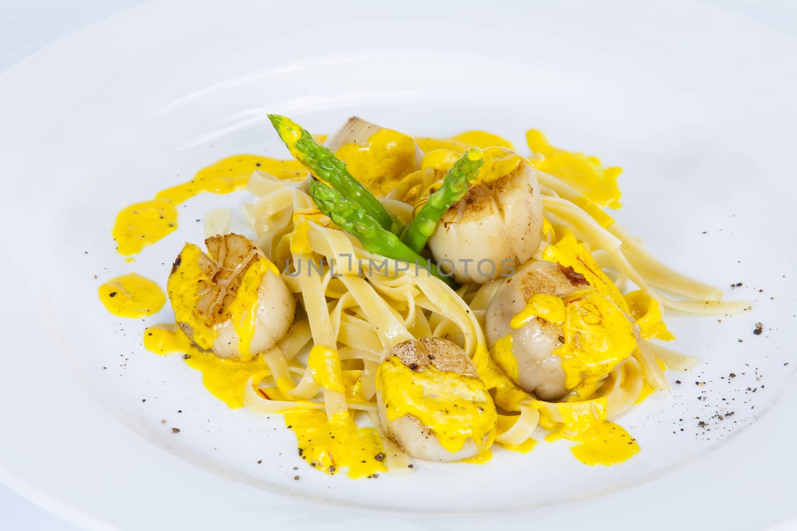 Egg Noodles with scallops;Thai food in a luxury hotel.