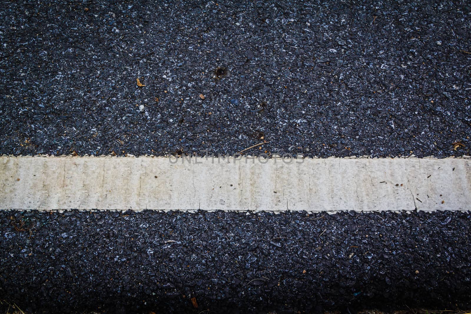 lines and tire tracks. Close up photo with selective focus