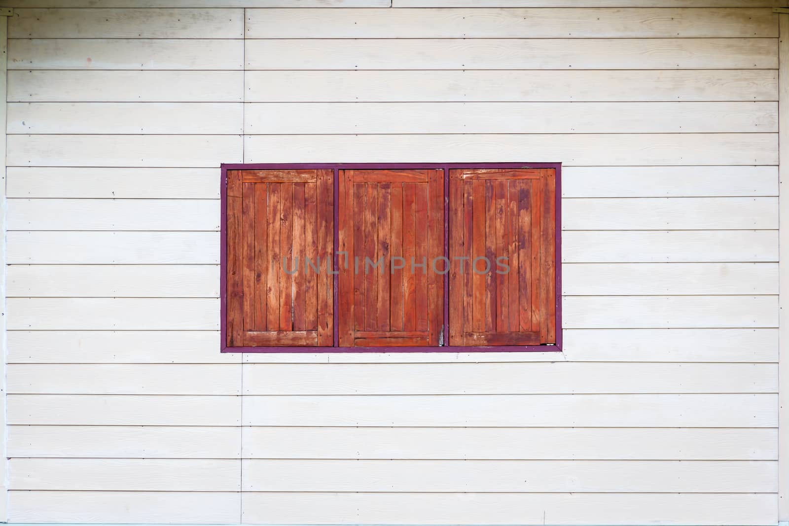 the white wall and wood windows, background