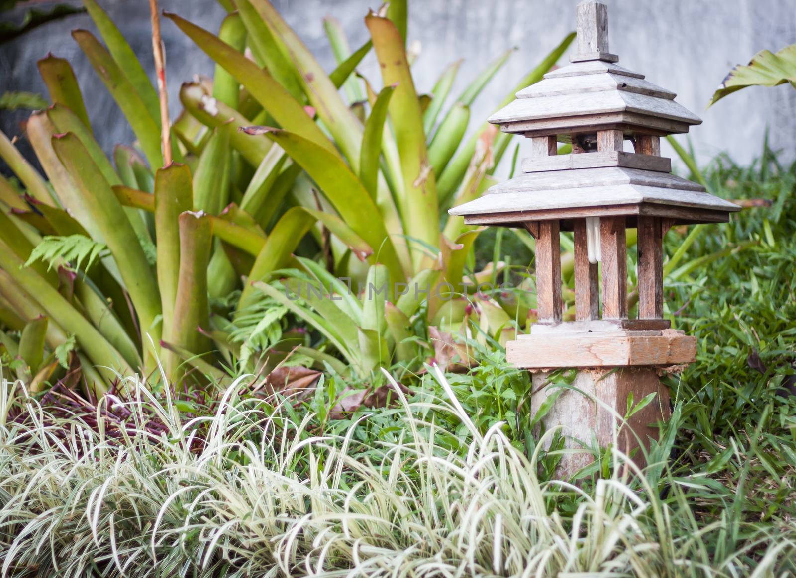 Wooden lamp decorated in garden, stock photo