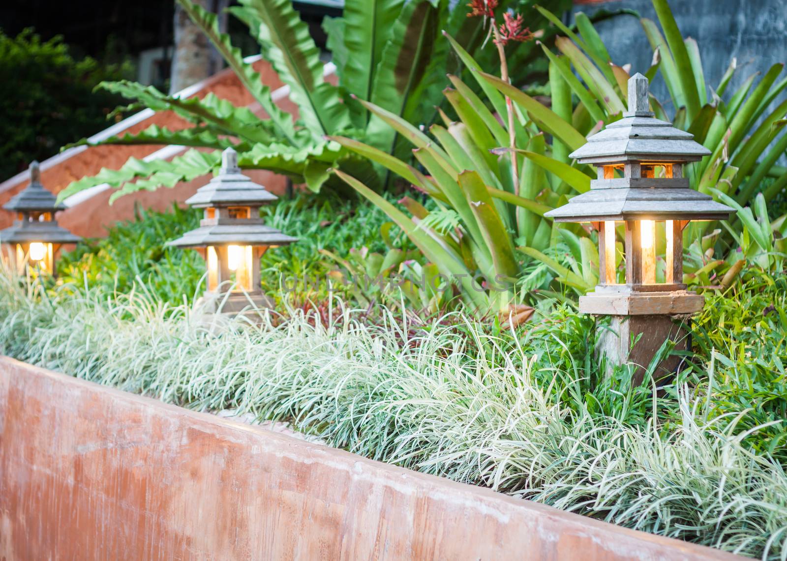 Wooden lamp decorated in garden, stock photo