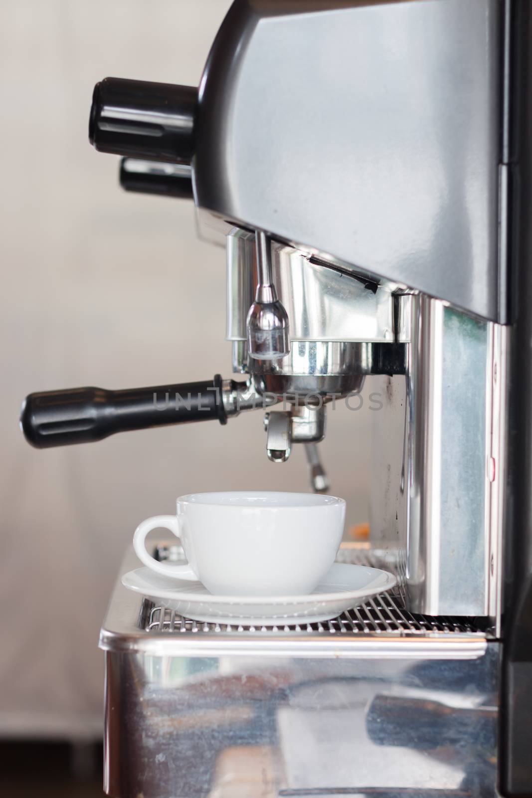 Coffee cup with espresso machine, stock photo