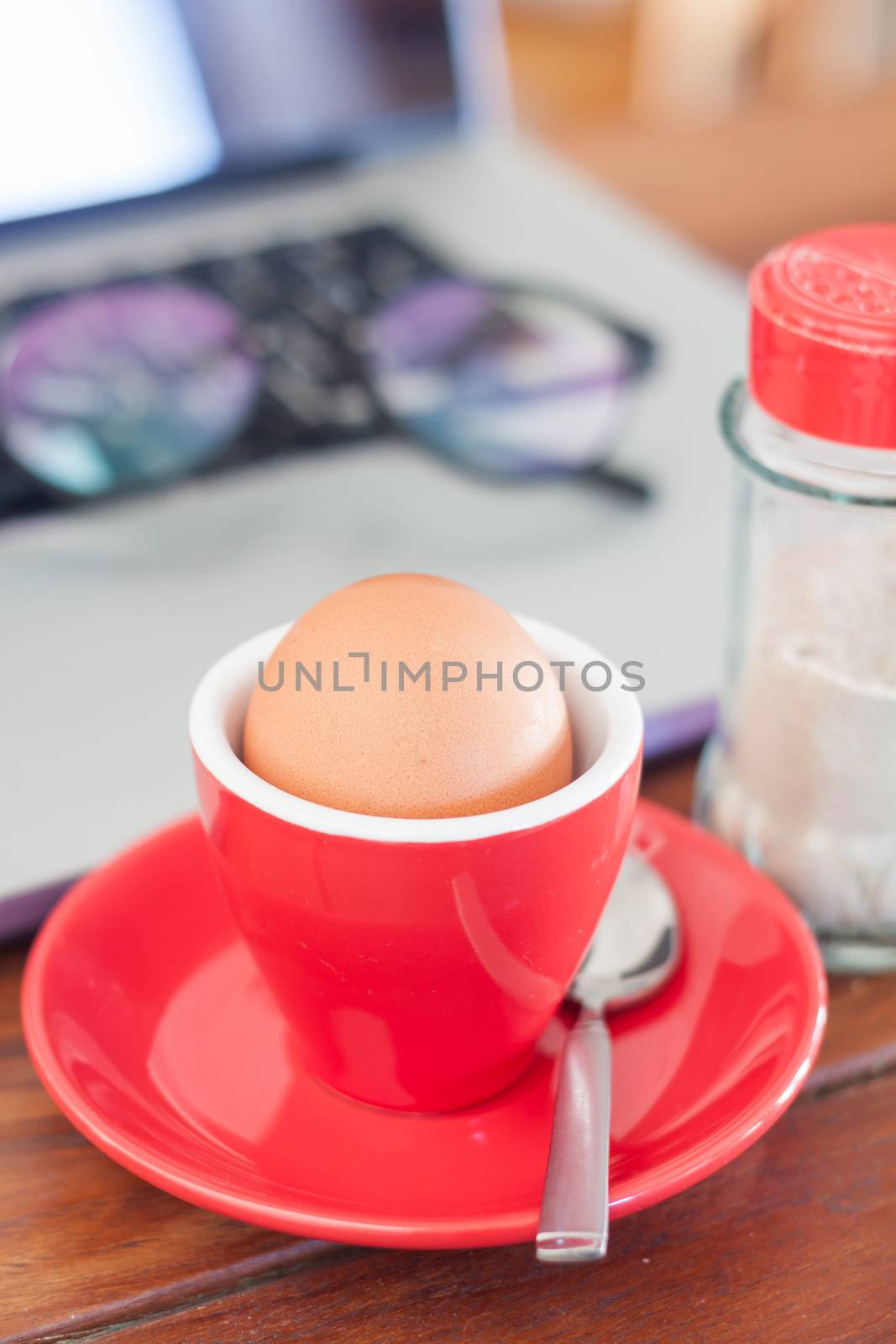 Medium boiled egg breakfast on work station by punsayaporn