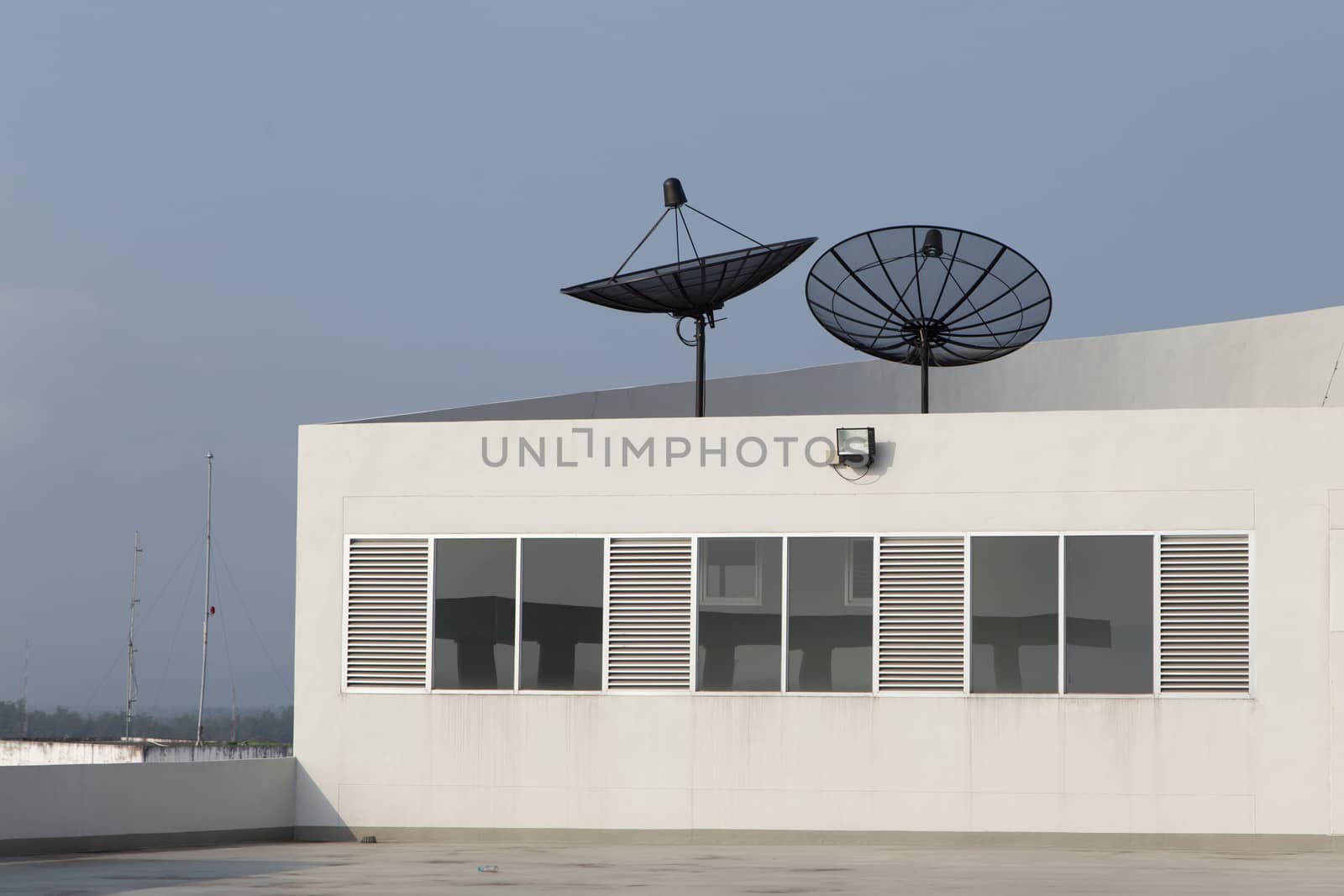 Satellite Disc on rooftop by ngarare