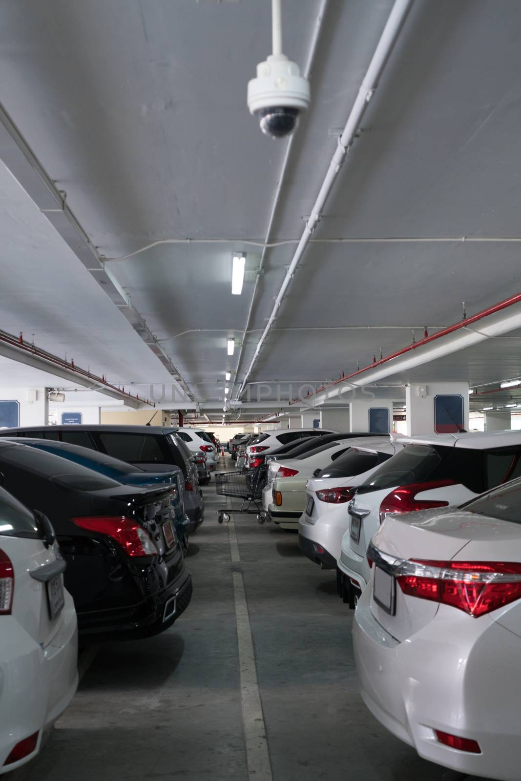parking lot indoor with cars