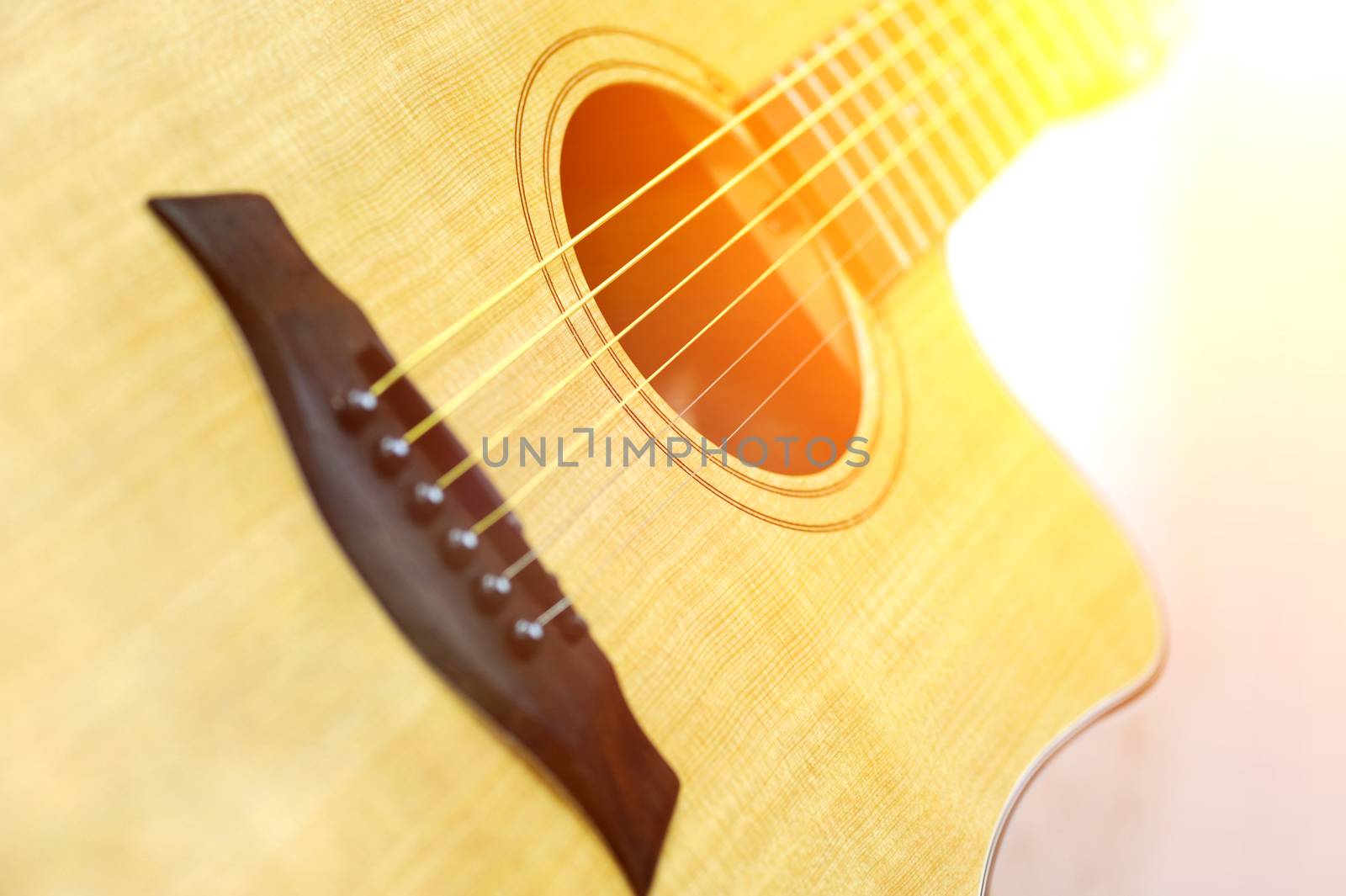 Close-up acoustic guitar  by byrdyak