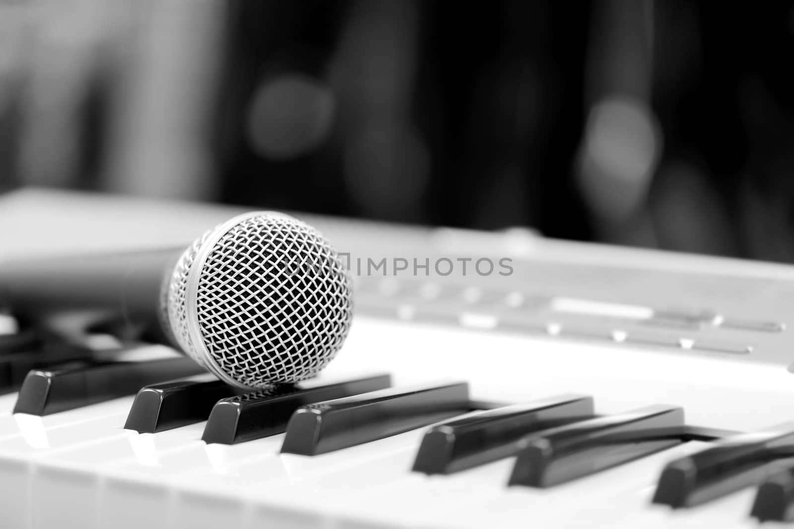 Classical microphone on keyboard by byrdyak