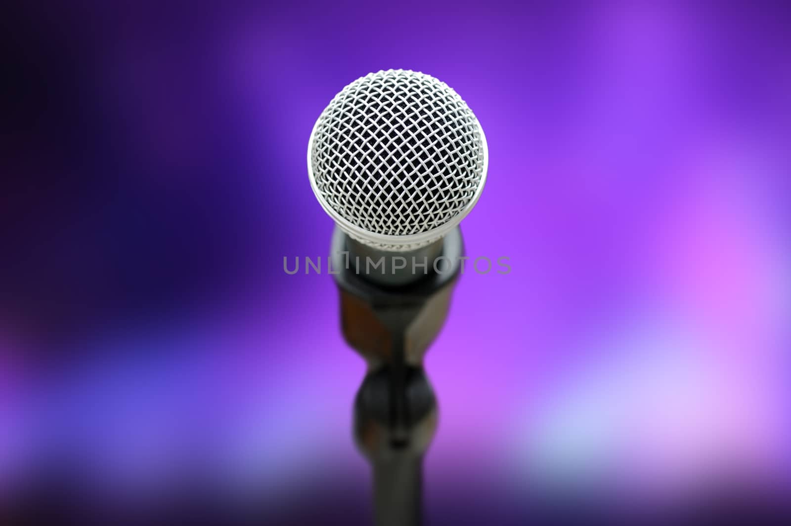 Close-up of microphone by byrdyak