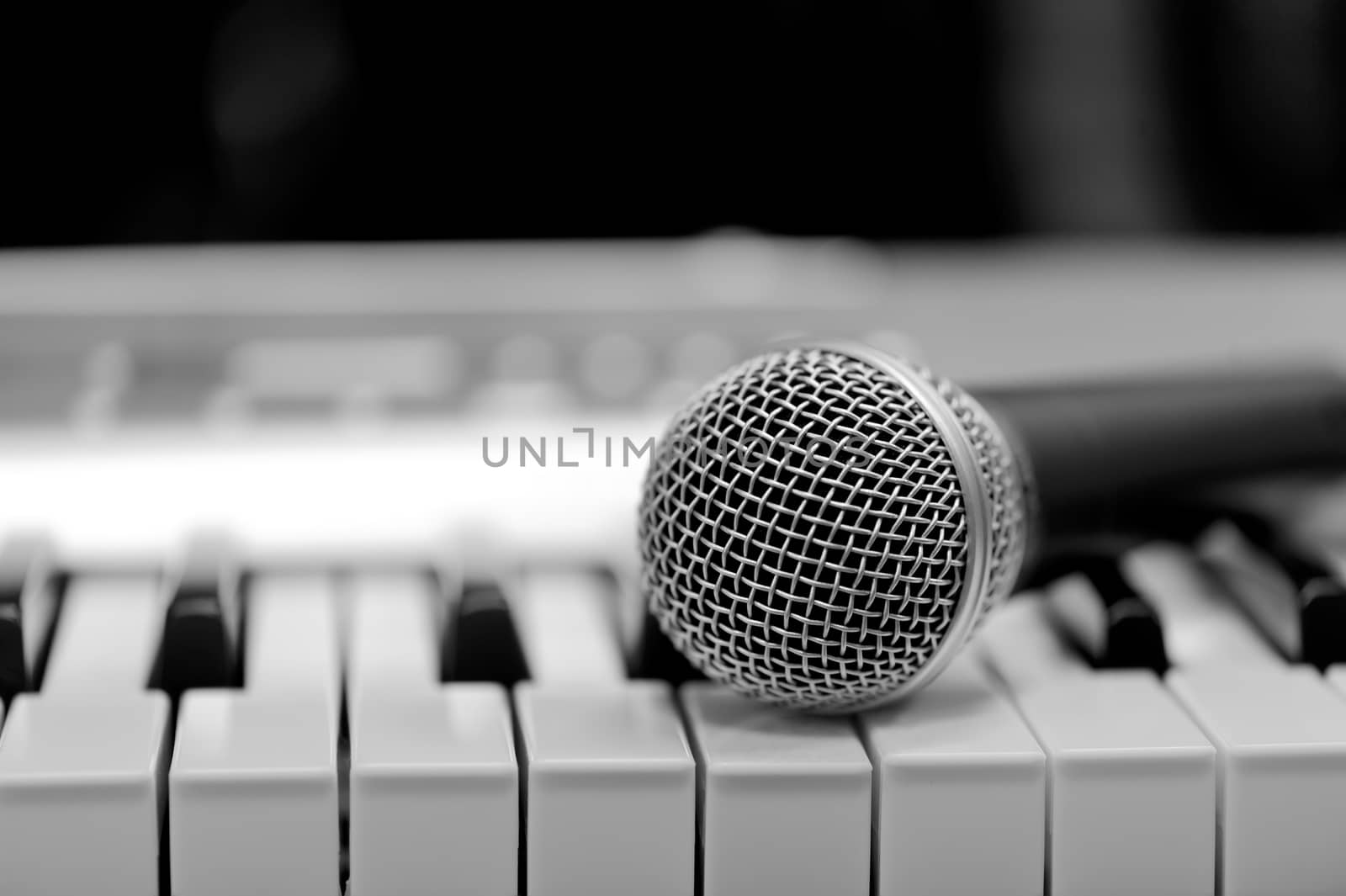 Classical microphone on keyboard by byrdyak