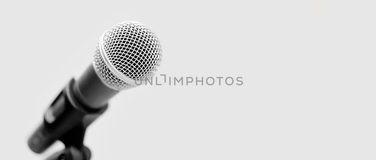 Microphone on a white background by byrdyak
