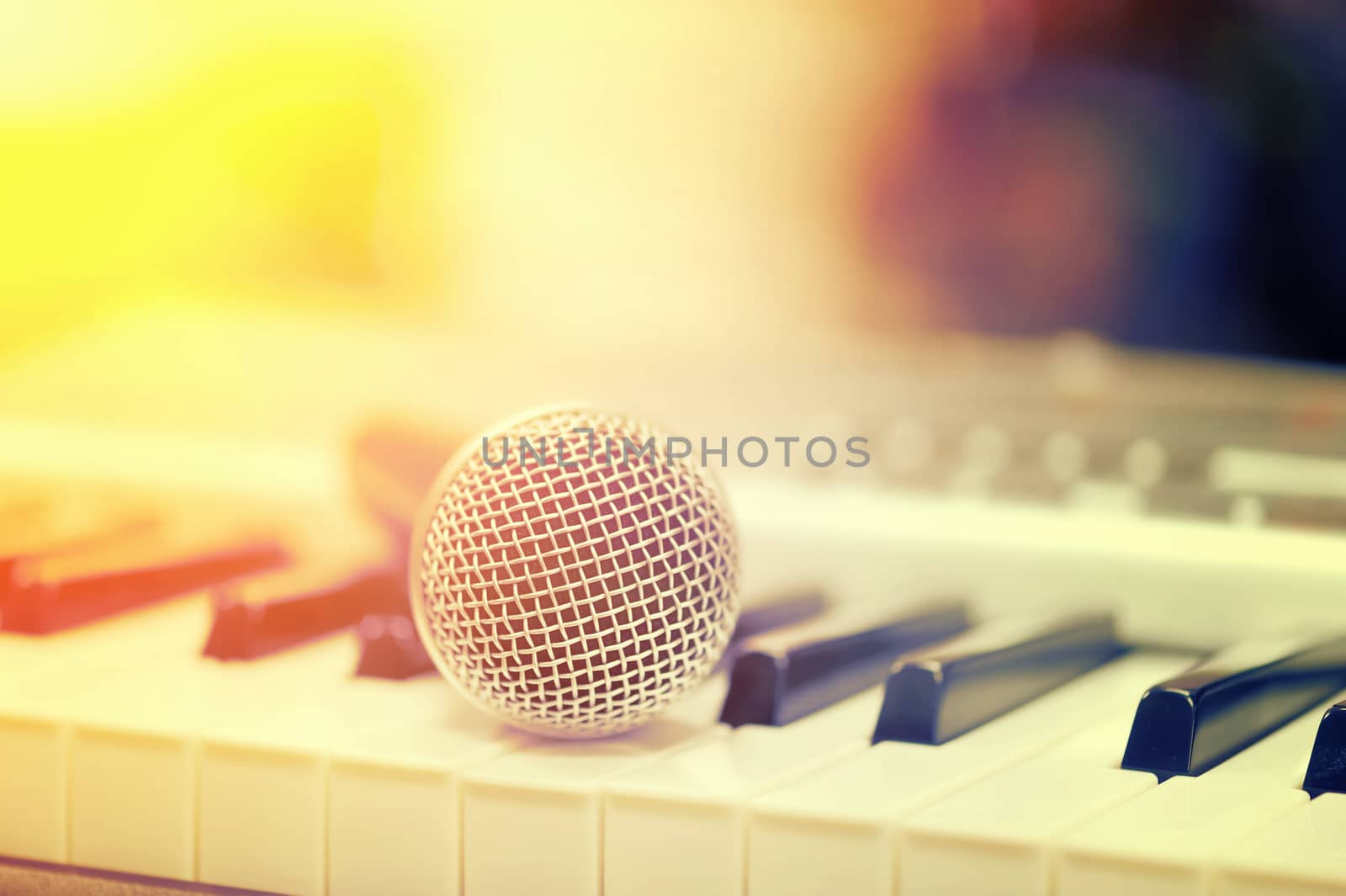 Close-up classical microphone on electronic keyboard 