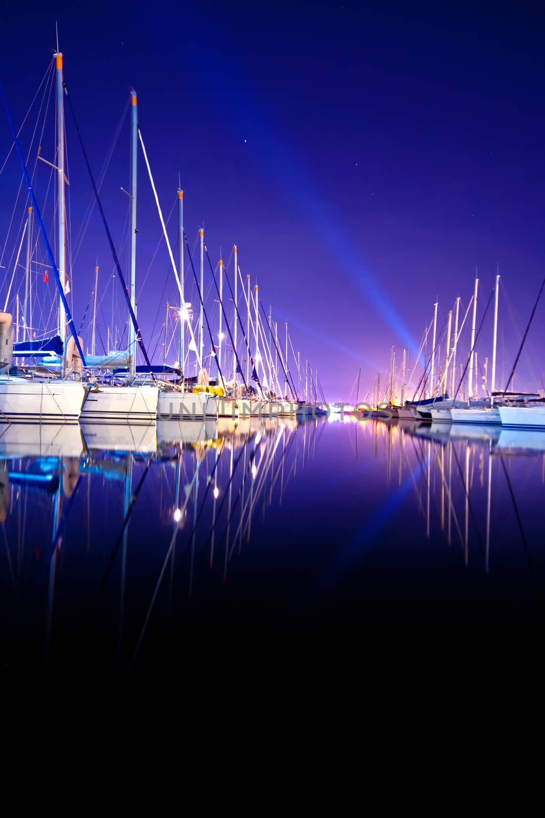 Yachts at a wharf at night in Turkey