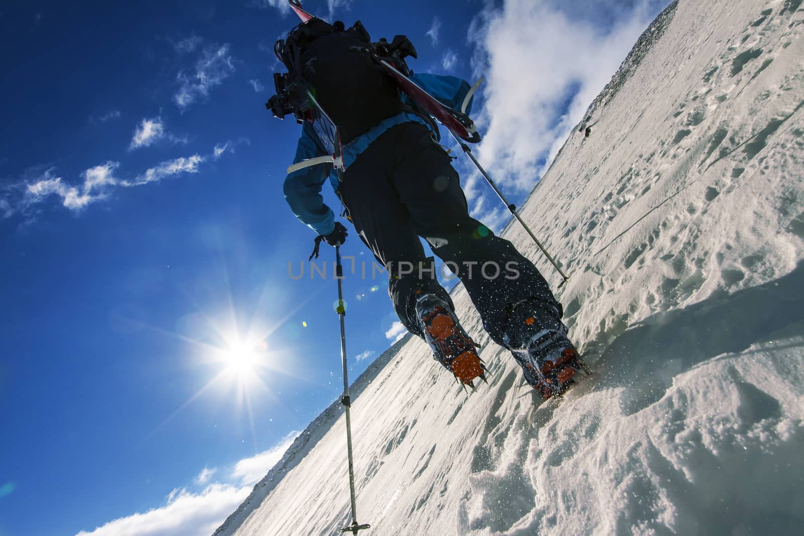 Freerider climbing a mountain by Chudakov