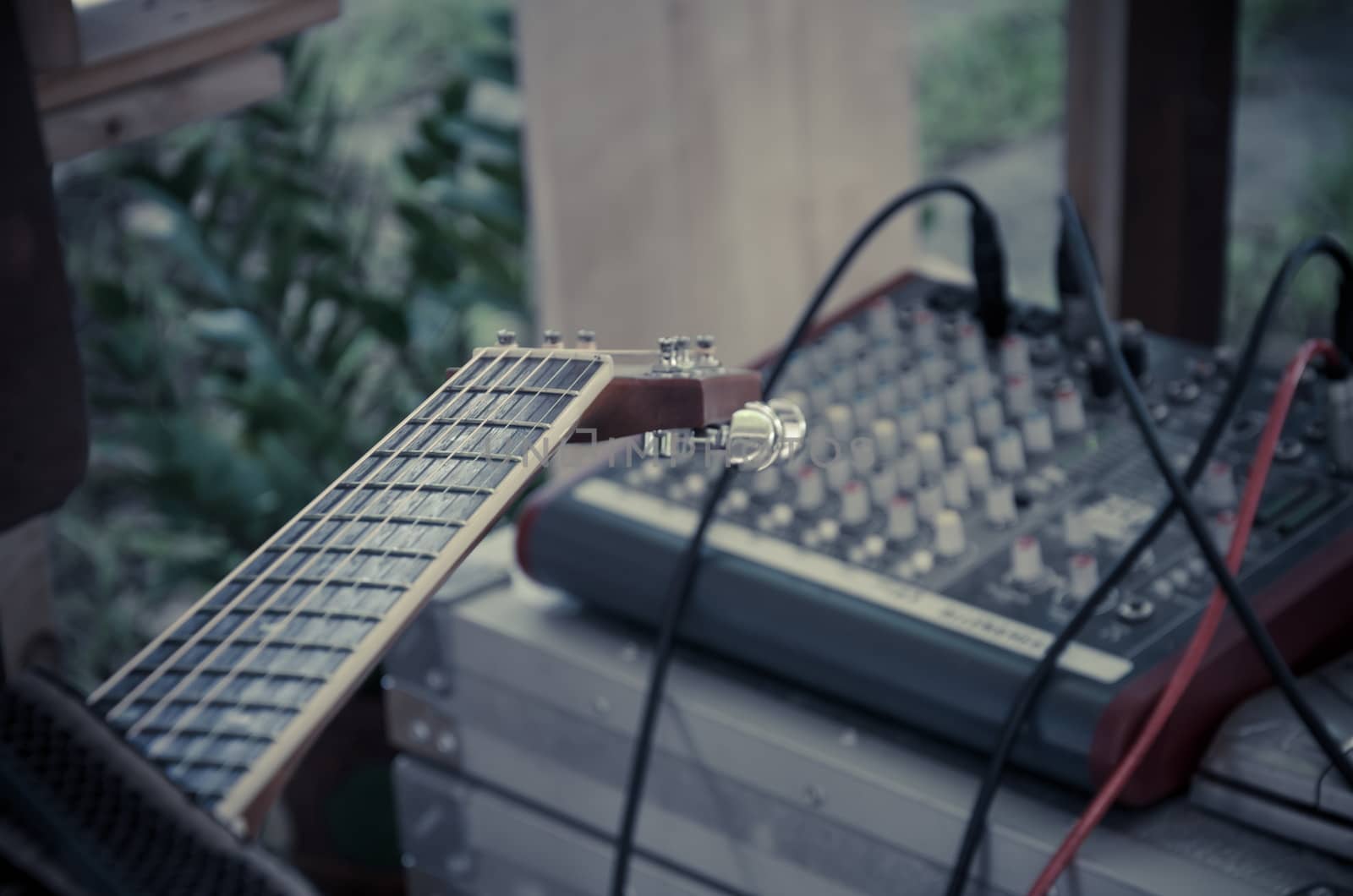 Close up of Fretboard of guitar mixer control by worrayuth
