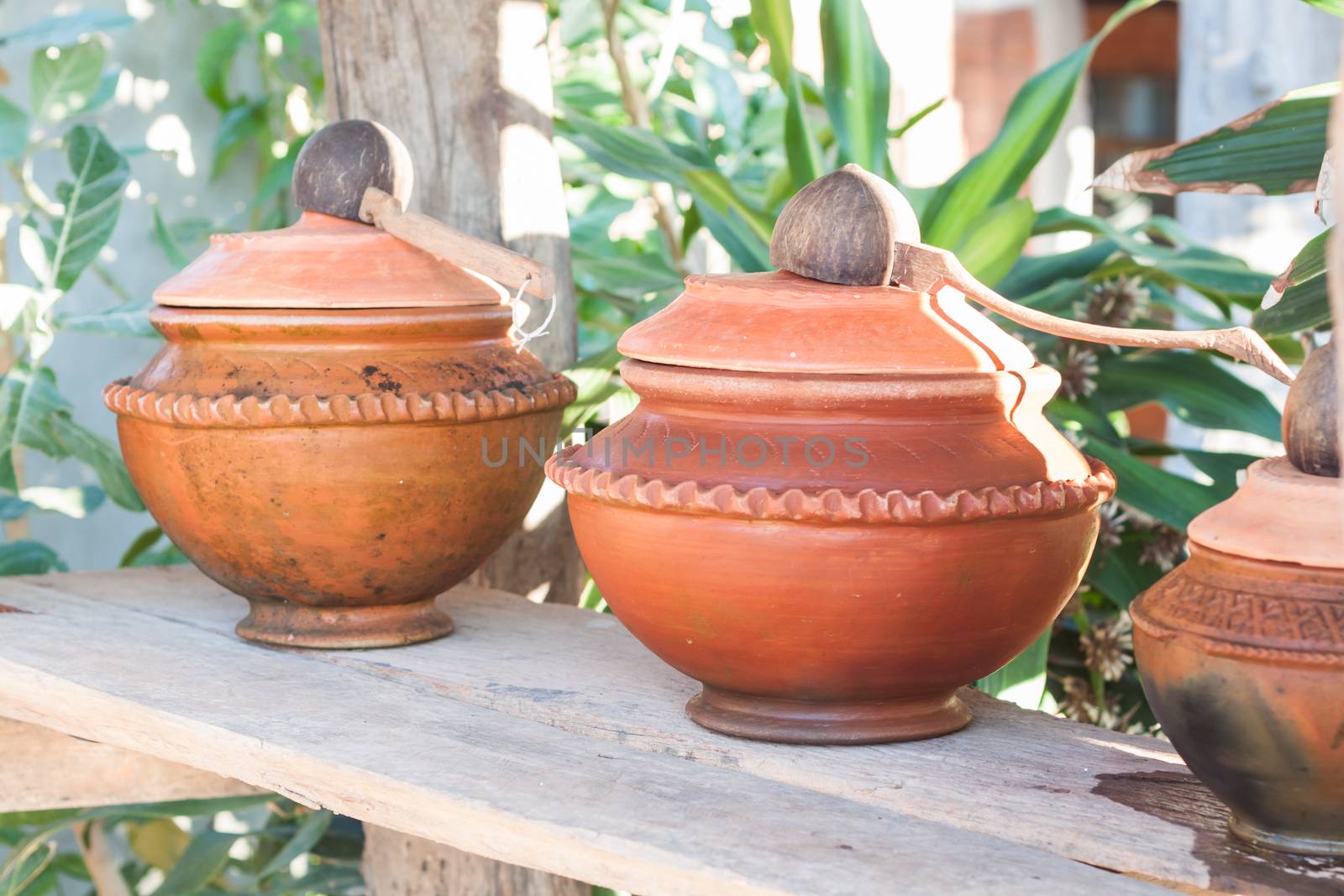 Clay pot filled with water, stock photo