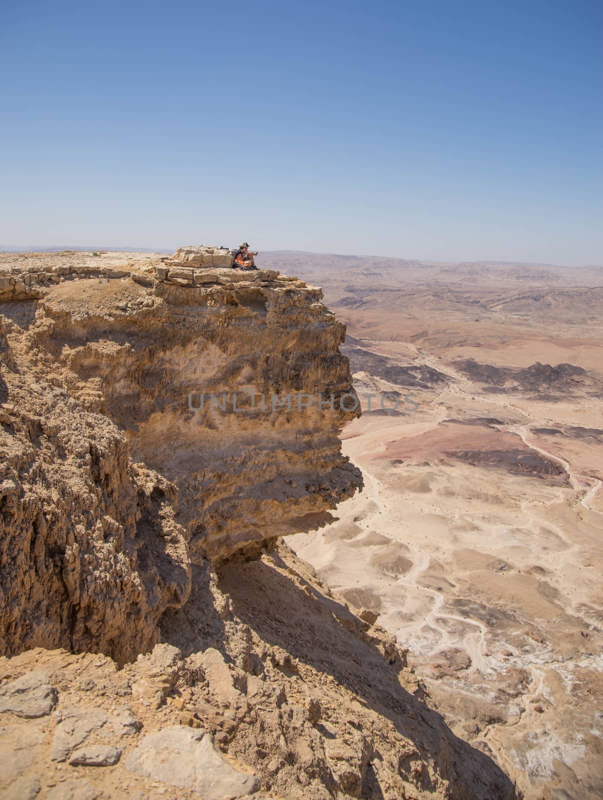 Hiking in stone desert mountain landscape of Israel