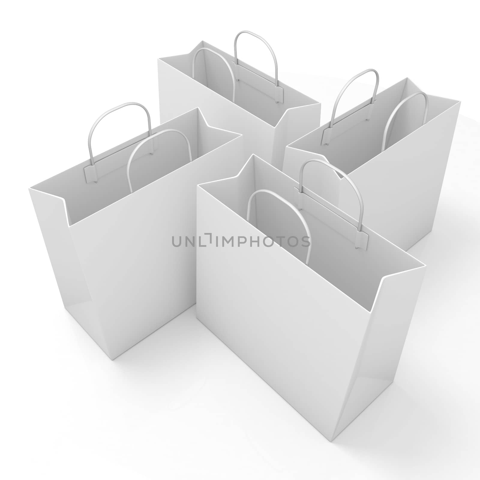 Empty paper bags, arranged and isolated on white. Side view