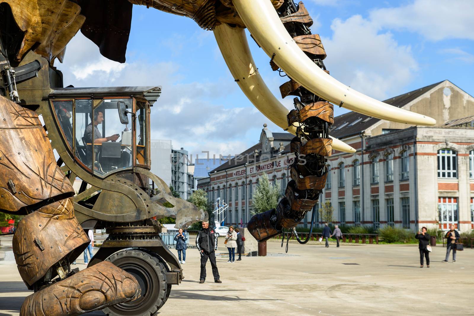 NANTES, FRANCE - CIRCA SEPTEMBER 2015: The Great Elephant goes for a walk with passengers aboard.