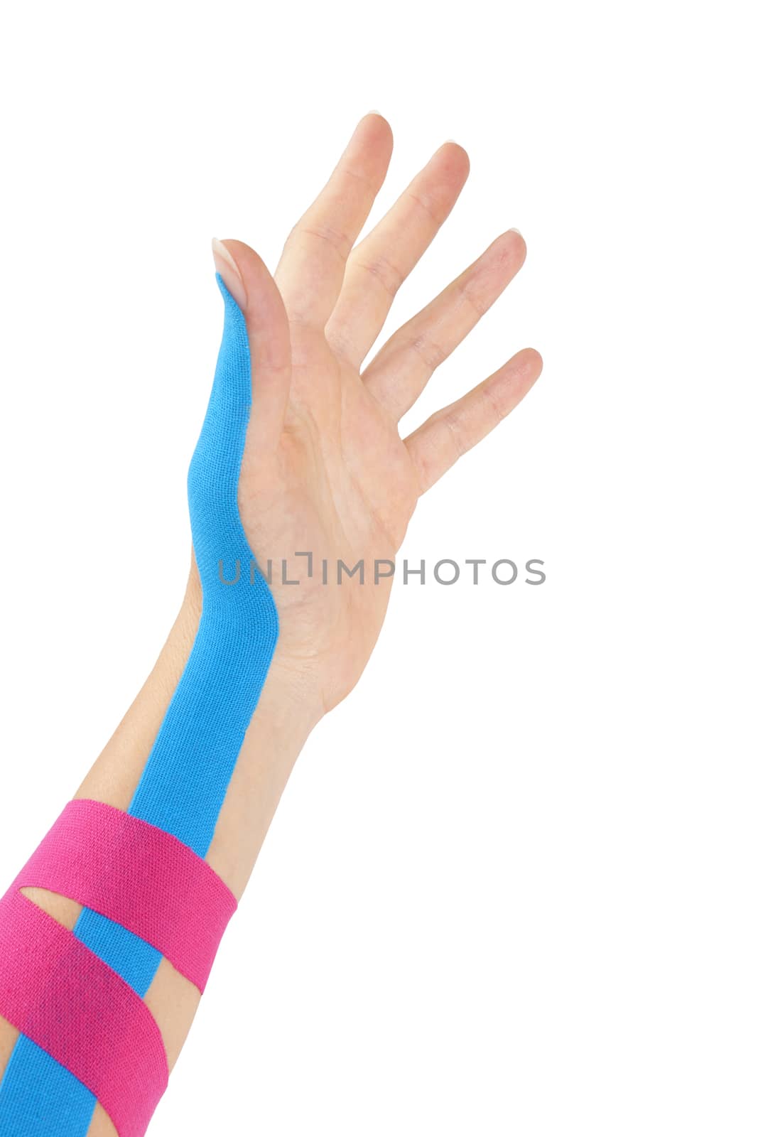 Kinesio tape on female hand. by eskymaks