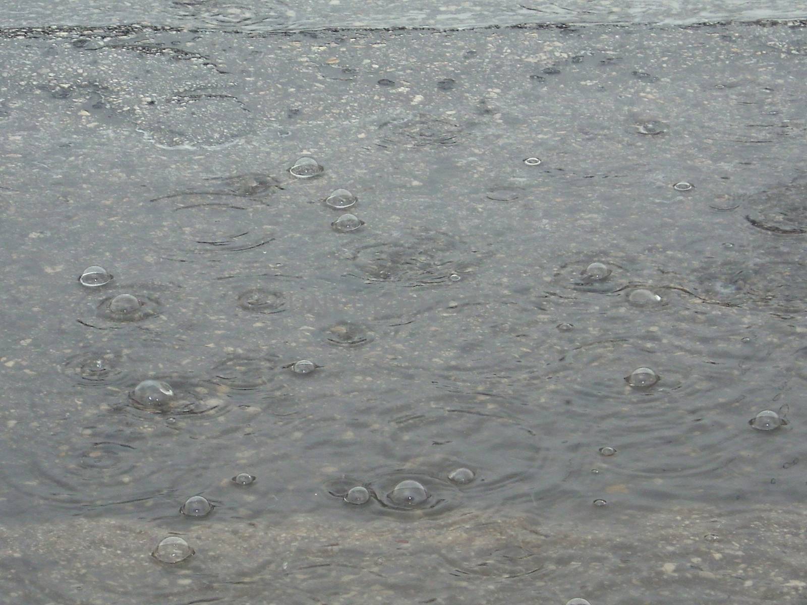 heavy rain in the puddles of rain by Irarlaki
