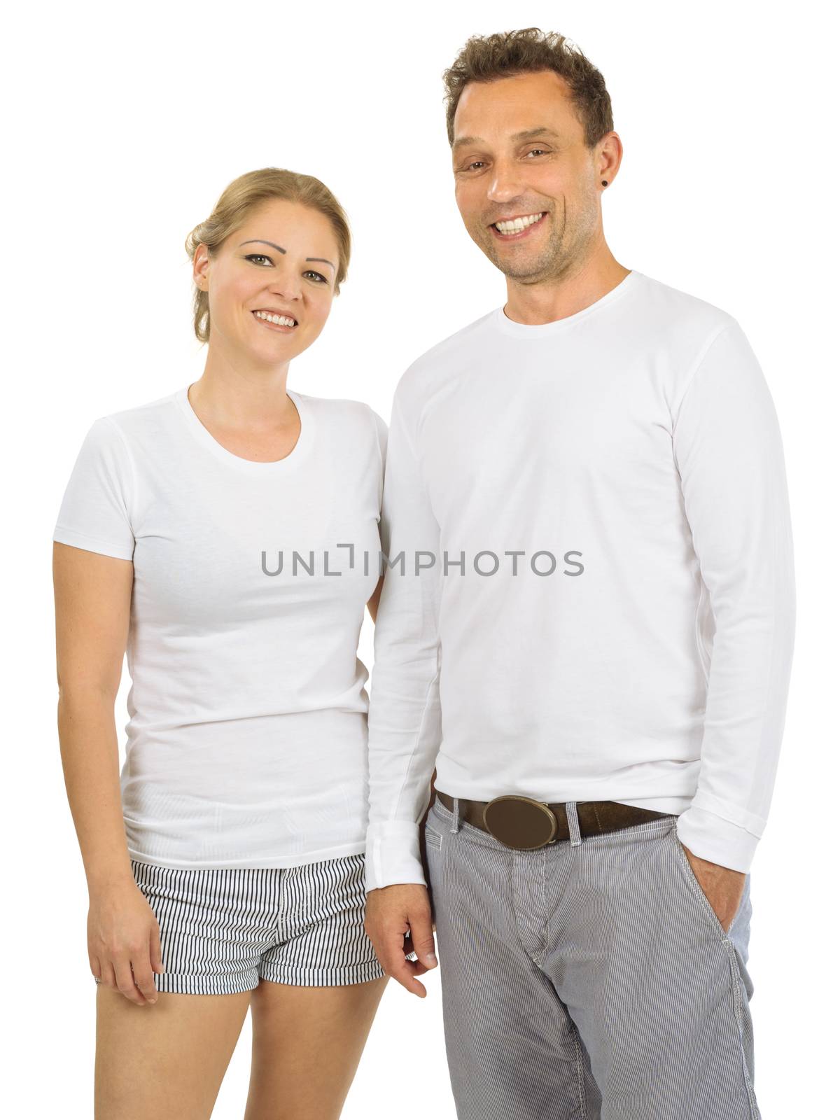 Photo of a woman and man posing with blank white shirts, ready for your artwork or design.
