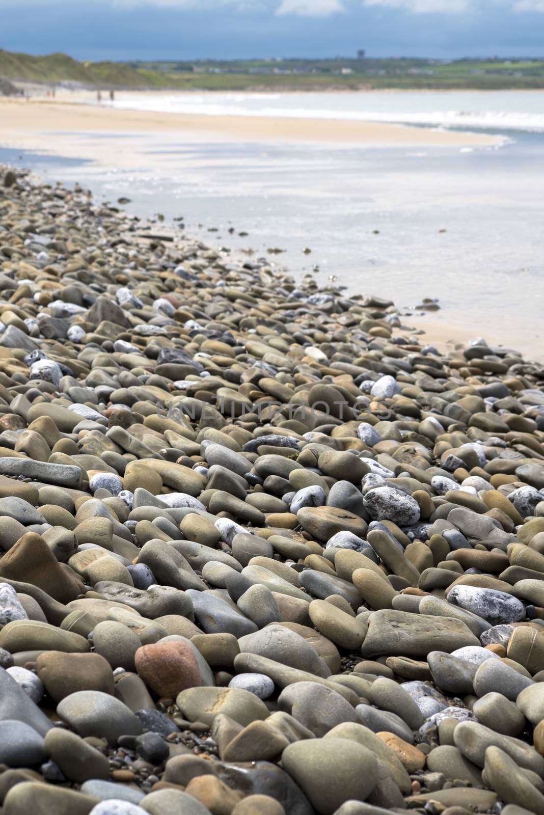pebbled beach beside the links by morrbyte